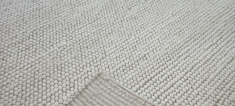 Charles Dibdin Handwoven Wool Durrie Ivory Loop ball 7.6x10 | Banana Manor Rug Company