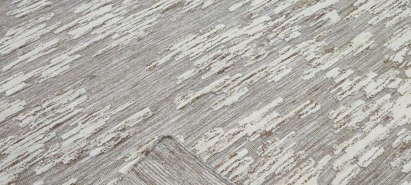 Emmett Skelton Hand-Knotted Modern Natural and Grey High-Low 8.3X10 | Banana Manor Rug Company