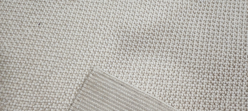 Jane Wiseman Handwoven Wool Durrie Ivory Loop 6.9x9 | Banana Manor Rug Company