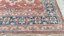 Sam 7.9x9.10 Rust and Blue Hand-Knotted Oushak Rug | Banana Manor Rug Company