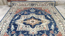 Becca 8x10 Blue, Rust, and Ivory Hand-Knotted Rug | Banana Manor Rug Company